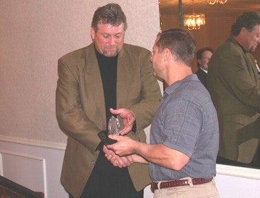 Kent Hull Receiving an Award from Dave Learn