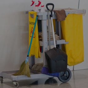 janitor cart with bag, caution sign and broom set